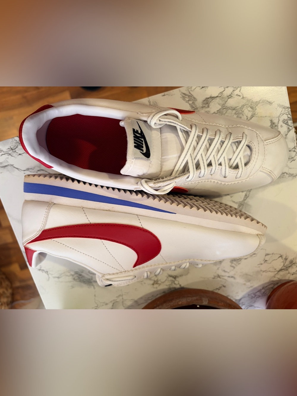 Nike Men’s White Leather Sneakers with Red Swoosh and Blue Midsole Accent - Picture 3 of 9